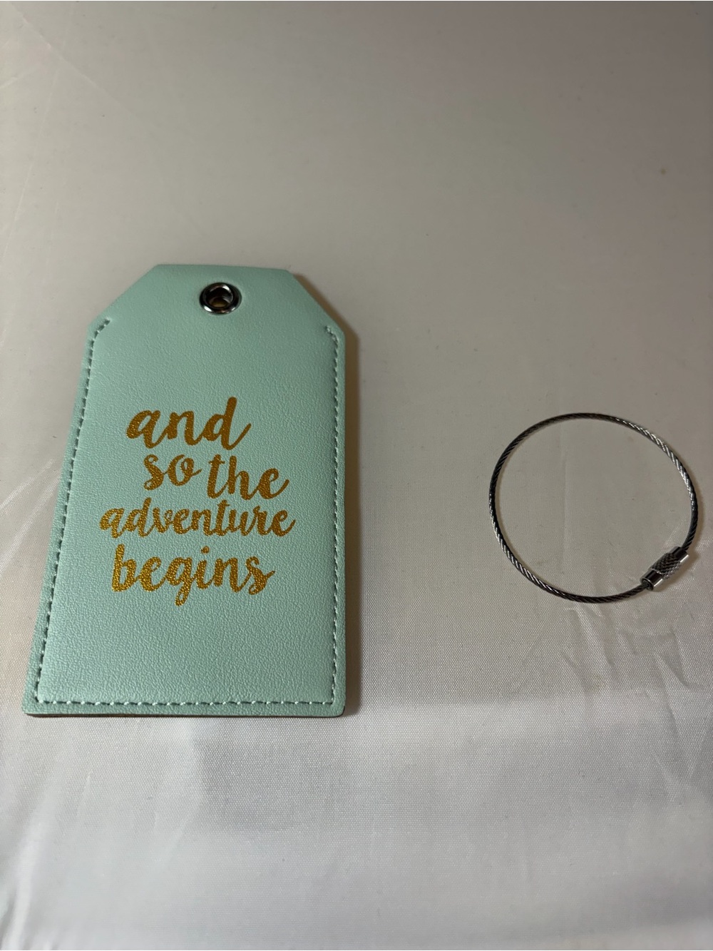 Casmonal 'And so Adventure begins' faux leather luggage tag teal